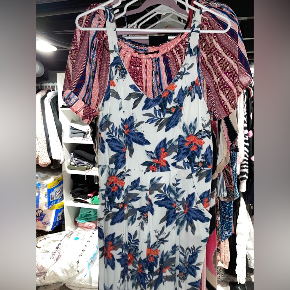 Romper from charlotte rouse size medium barely worn white and blue w/ floral